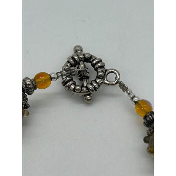 Artisan Lampwork Glass Bracelet With Amber Gold Swirl and Faceted Beads - Picture 10 of 16